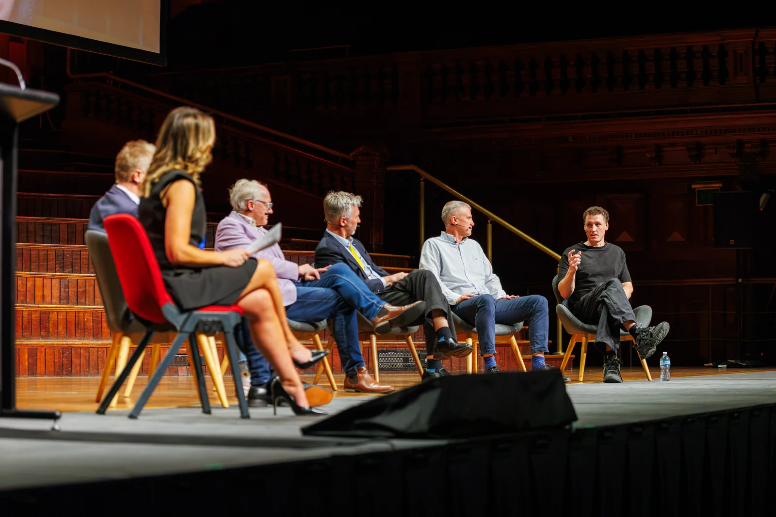 Open Summit speakers in conversation on stage during a panel discussion