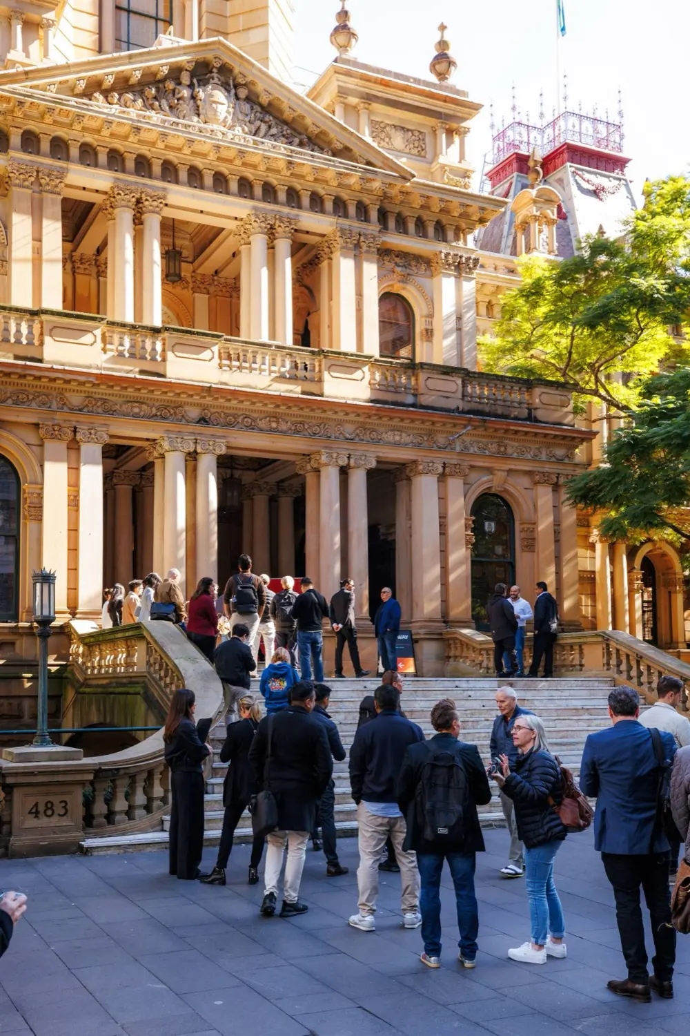 Attendees arriving outside Sydney Town Hall.